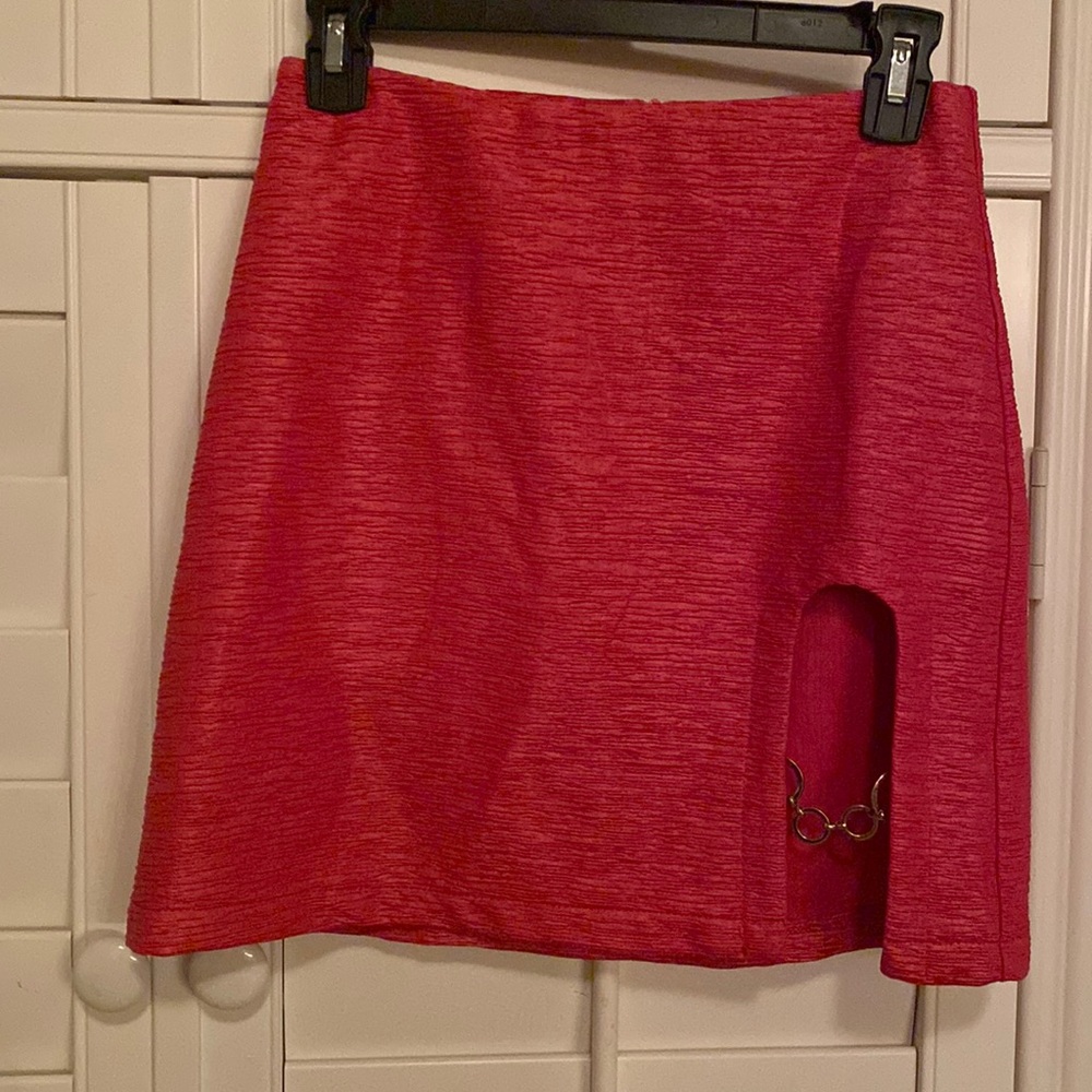 High waist, above the knee, hot pink skirt with side slit